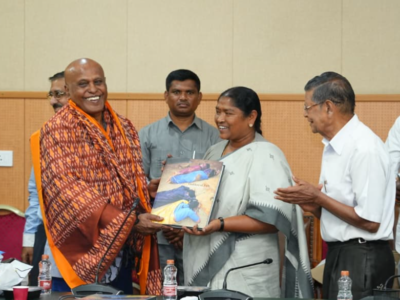 seethakka launches medaram festival coffee table book