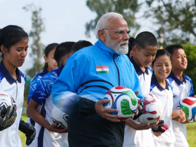 modi plays foot ball