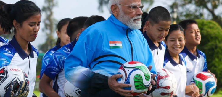 modi plays foot ball