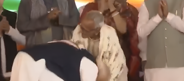 modi touches feet of an old man